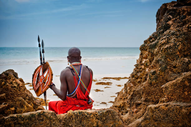 Maasai person next to a water source in Kenya